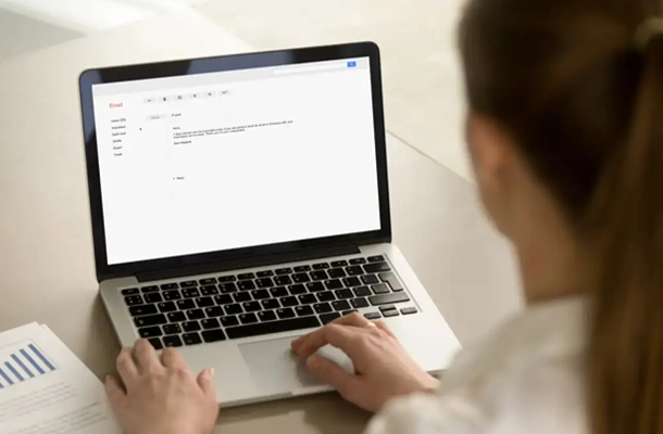 woman logging into Domains Priced Best